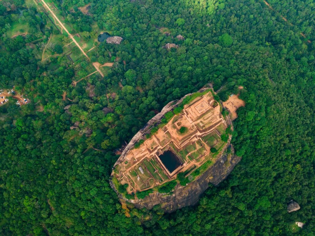 aerial-view-of-sigiriya-rock-at-misty-morning-sri-2023-11-27-05-36-58-utc-scaled